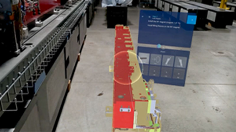 POV of an augmented reality holographic image displayed in the Argonne National Laboratory during an assembly process