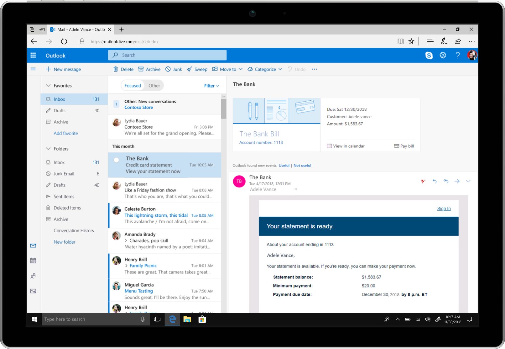 A tablet showcases bill pay reminders in Outlook.