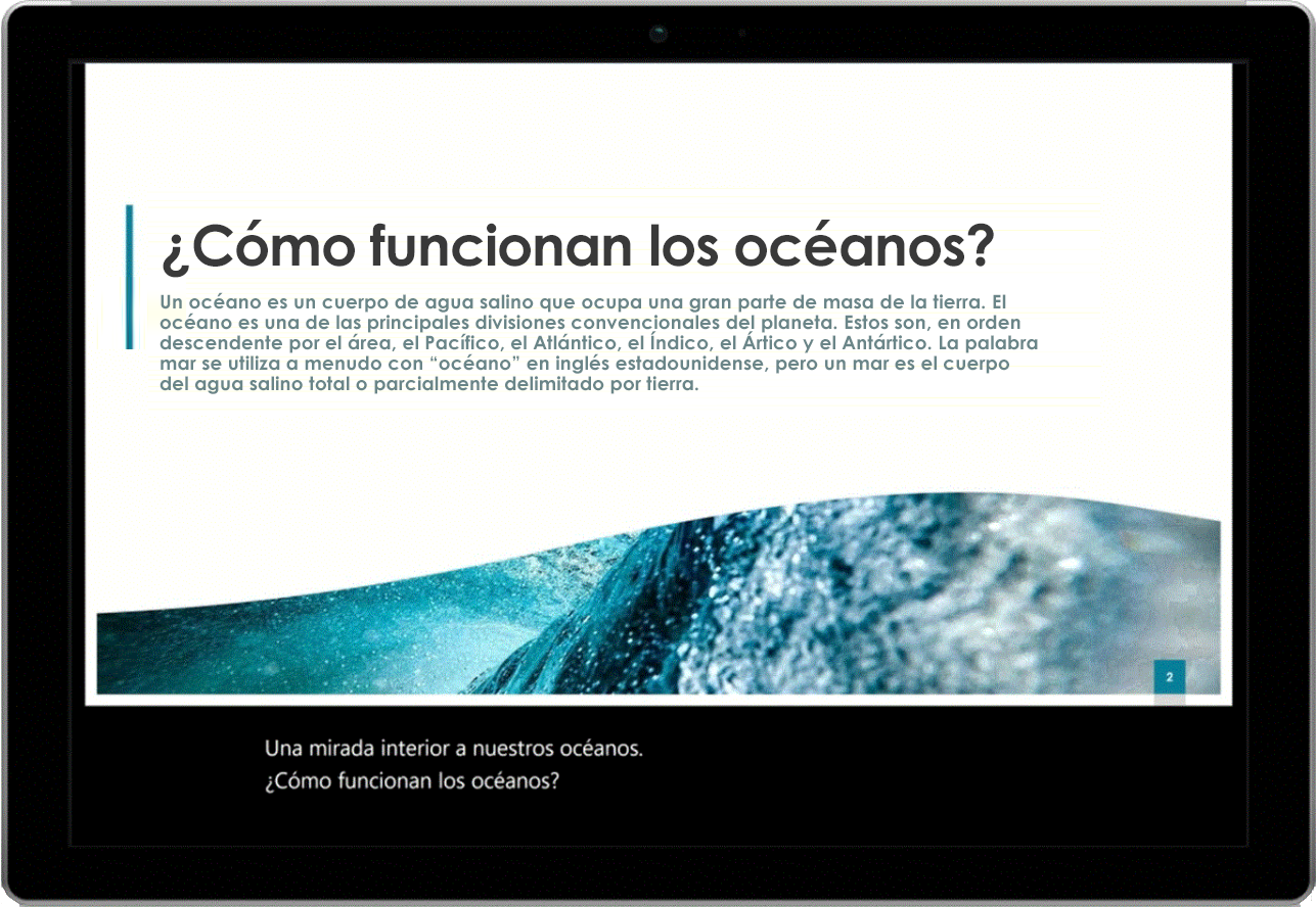 Imagen de una tableta en la que se muestra una diapositiva de PowerPoint sobre océanos. Los subtítulos en vivo aparecen en la parte inferior de la pantalla.