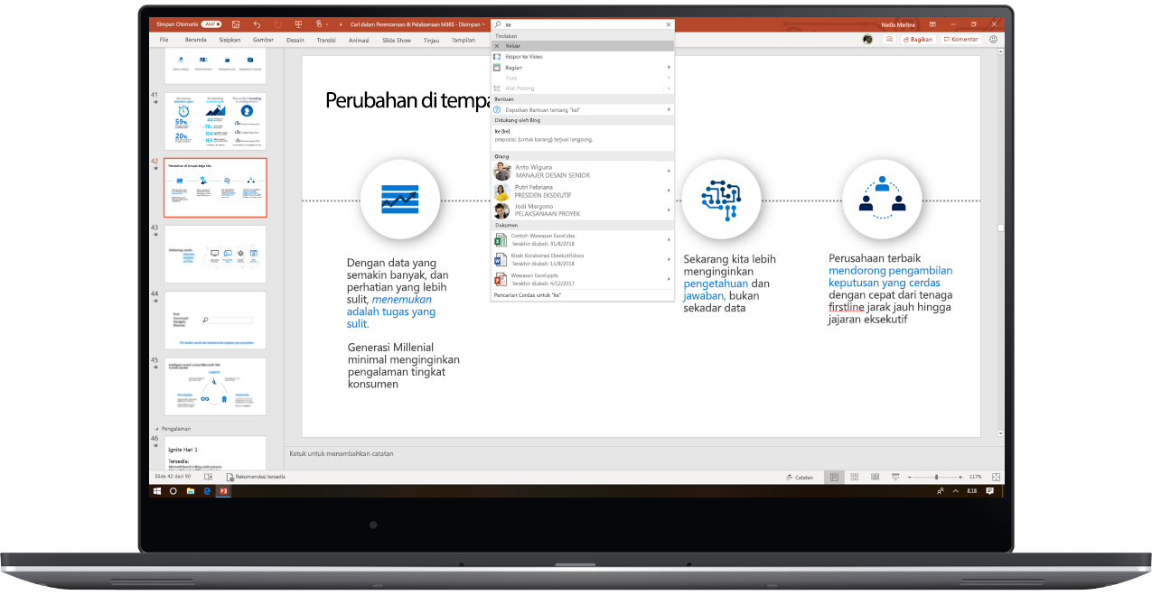 Gambar laptop yang menampilkan dek presentasi PowerPoint, dengan pengguna yang menggunakan Microsoft Search.
