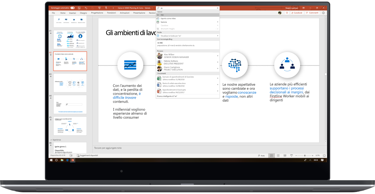 Immagine di un laptop aperto con una presentazione di PowerPoint in cui l'utente usa Microsoft Search.