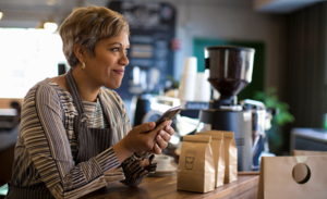 Image of a small business owner using a mobile device.