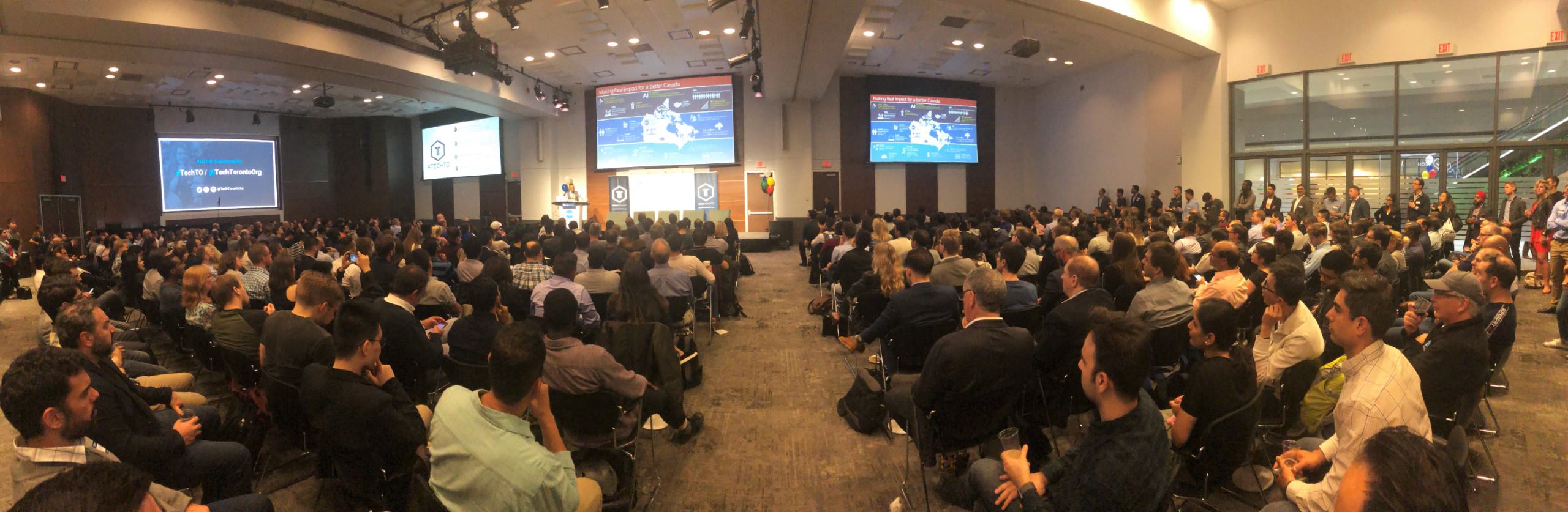 A photograph of the big audience attending the Microsoft AI event