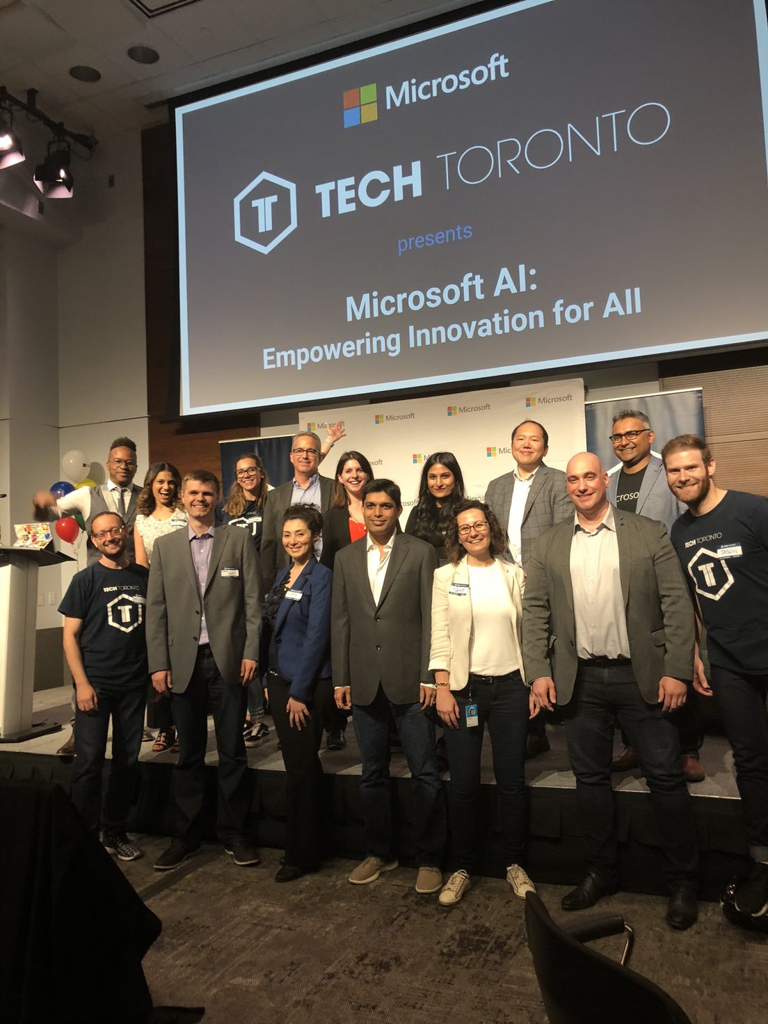 A photograph of the Microsoft AI event team