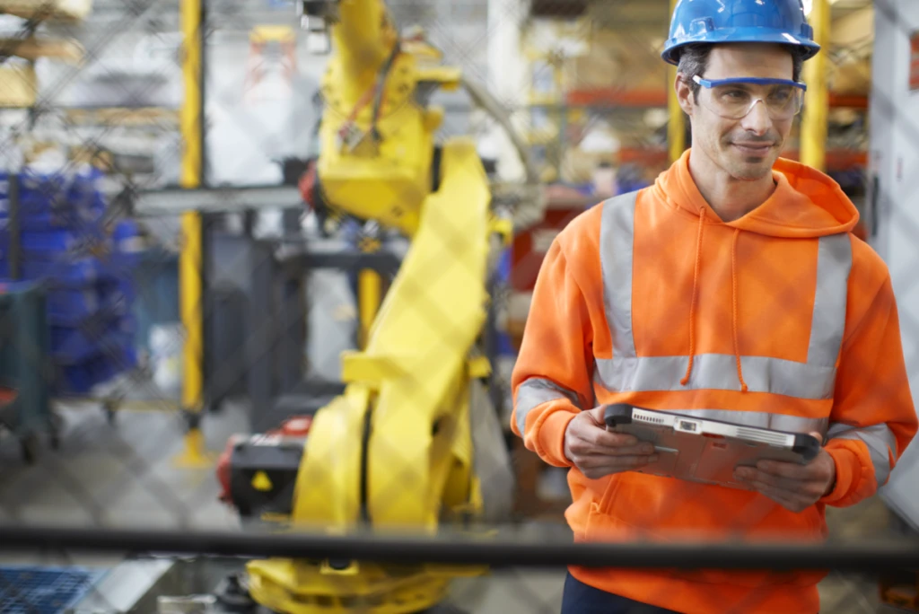 Manufacturing, Field Worker; Engineer holding tablet. Windows brand photography, featuring Panasonic ToughPad.