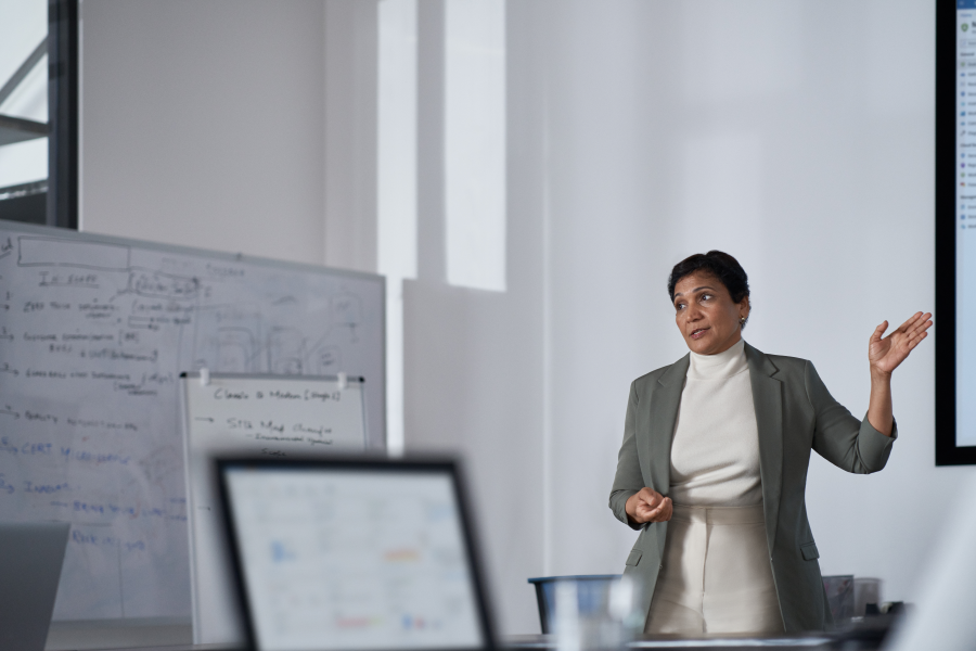 a person standing in front of a computer