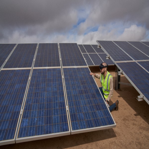 Field service technician servicing a solar panel