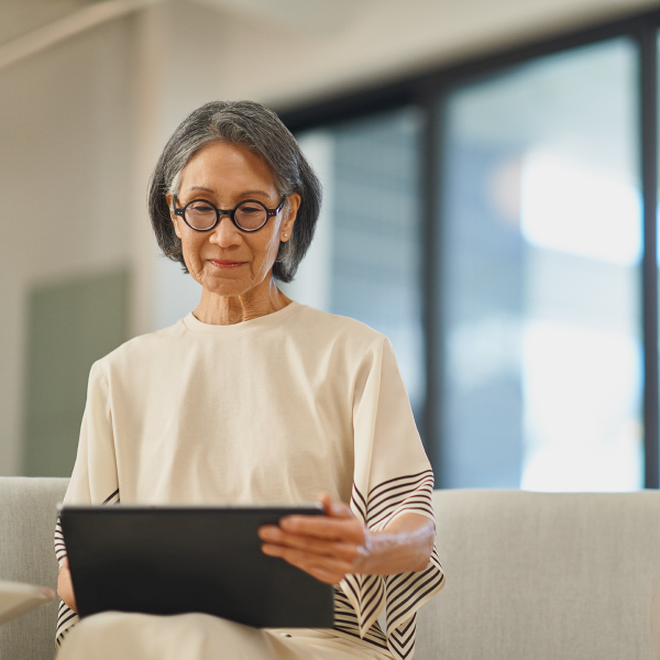 woman looking at a tablet