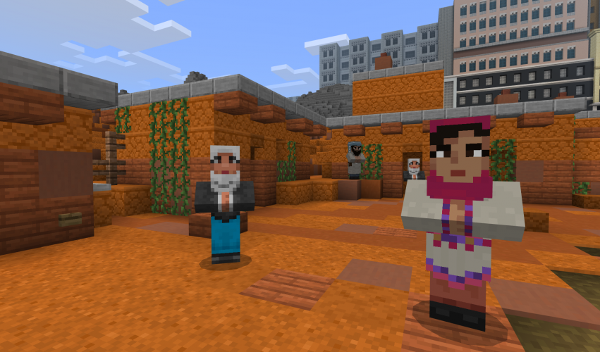 Malala stands near another person in a courtyard in Minecraft: Education Edition.