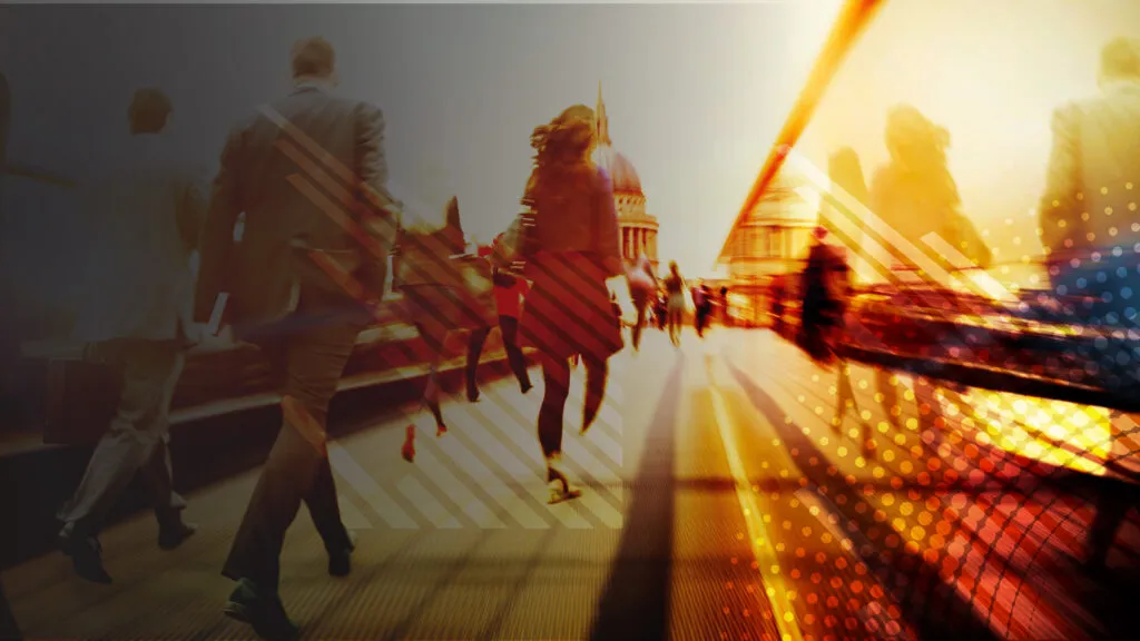 People walking along a bridge