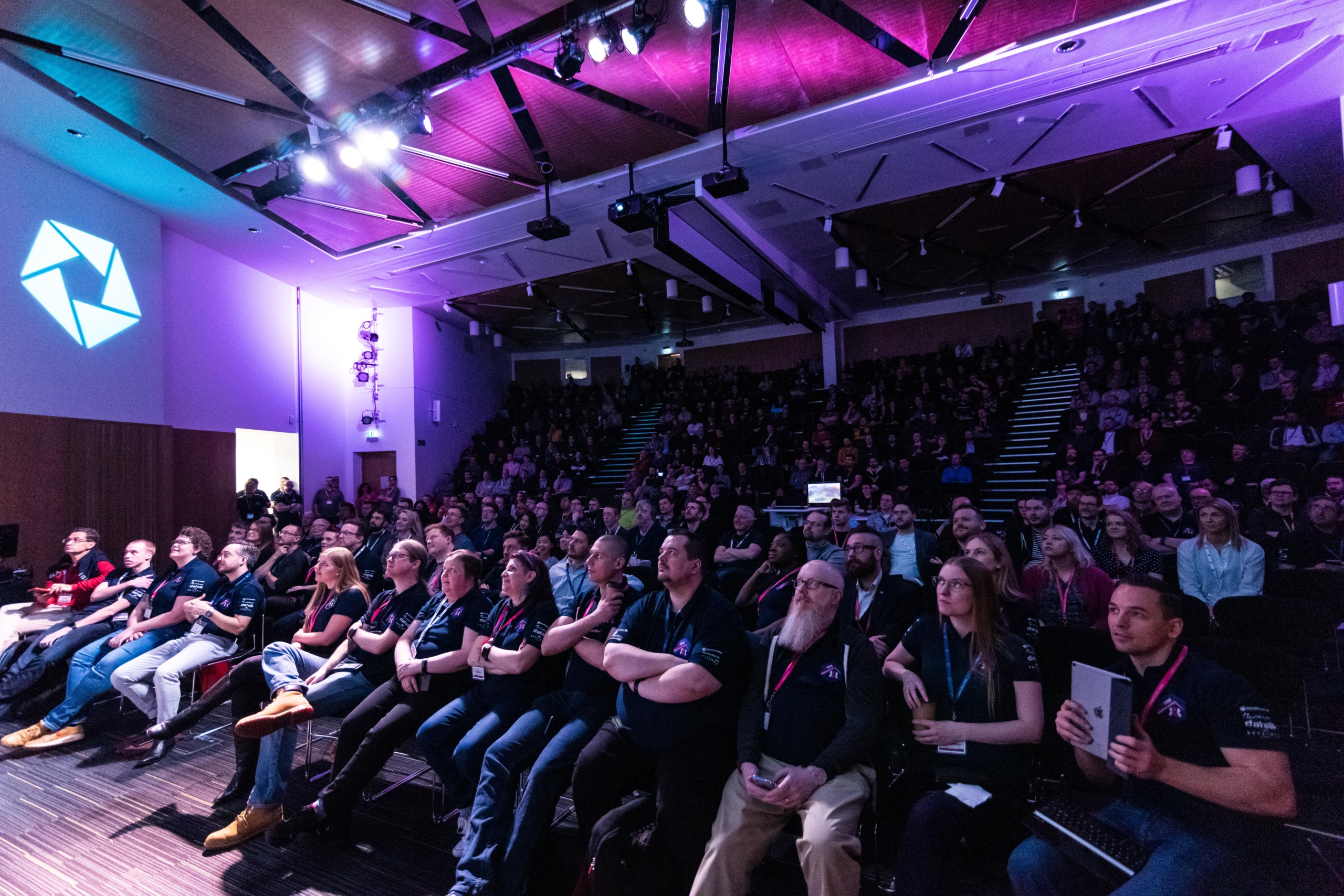 A photo of a large audience in a seminar room, taken at Scottish Summit 2020.