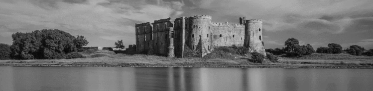 A black and white photo of a castle