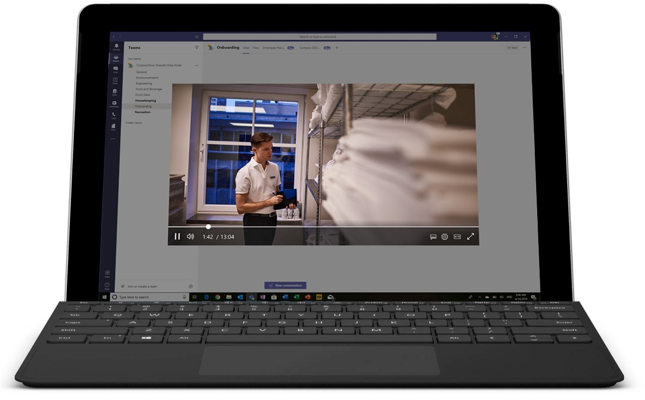 Image of a laptop open displaying a video in Microsoft Teams.