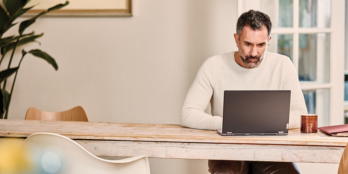 Image of a remote worker at his laptop.