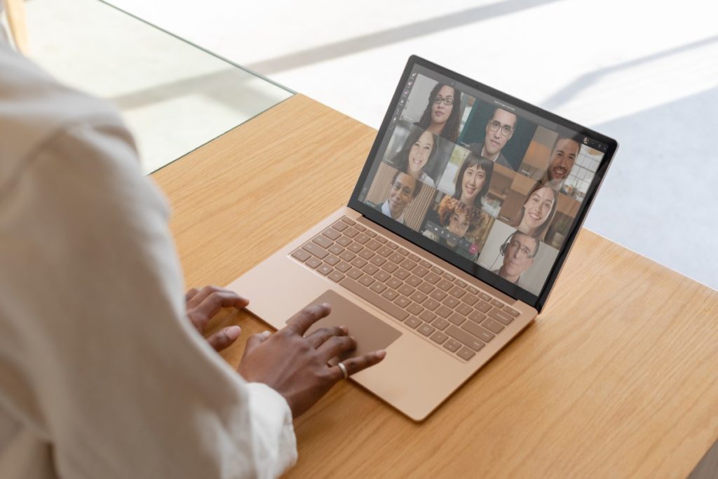 Contextual image of woman on Sandstone Surface Laptop 3 inside.