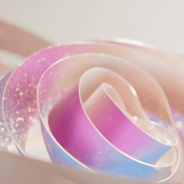A decorative animation of swirling cream, purple, and blue
