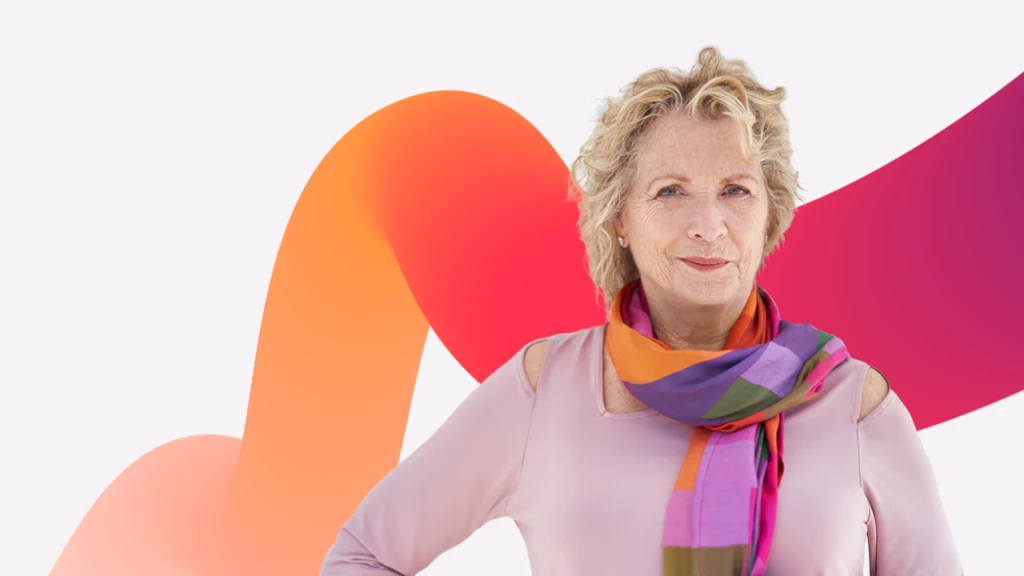 Portrait of a woman, with an orange and magenta squiggly graphic design in the background.