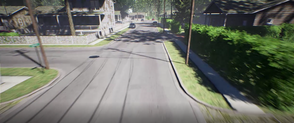 AirSim drone front-facing camera view of a street