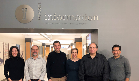 microsoft ability team stands in front of sign at university of texas at austin