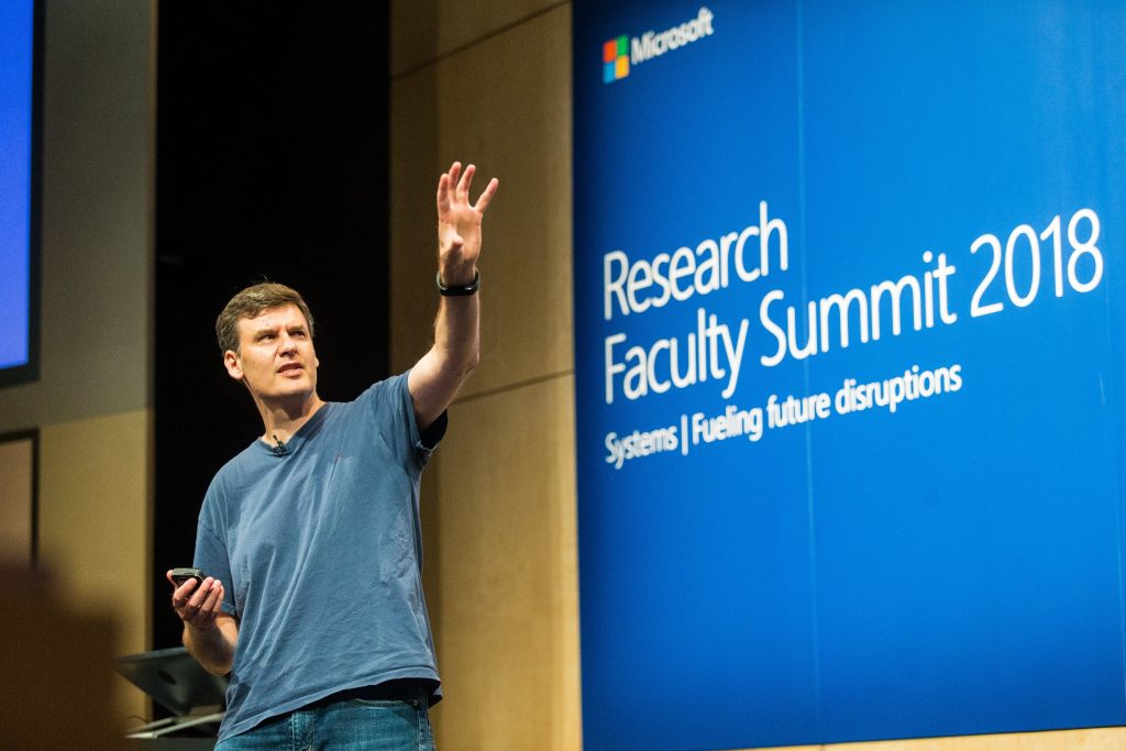 Microsoft's Donald Kossman presenting a talk on systems networking during Faculty Summit 2018.
