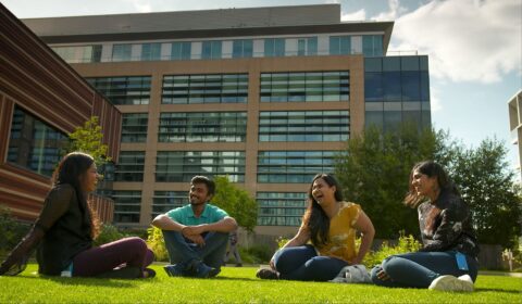 interns on the lawn of Microsoft Research Cambridge