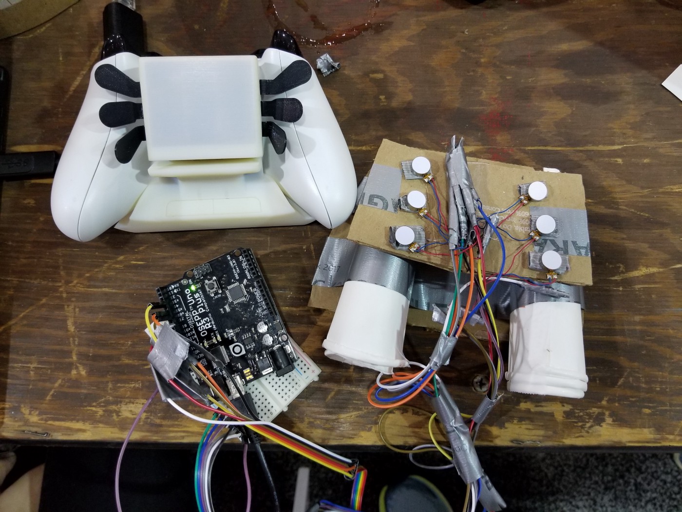 Photograph of adapative game controllers