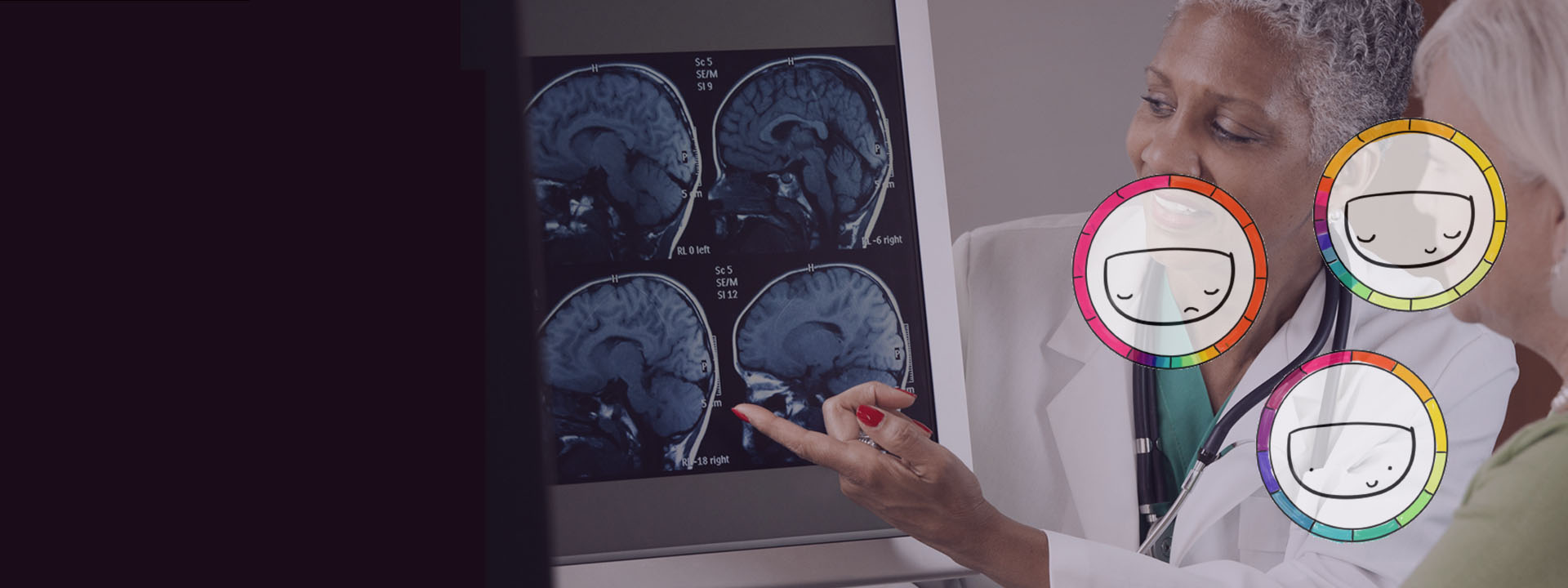 doctor showing patient her brain scan on a monitor