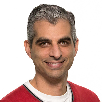 Portrait of Kareem Choudhry from Microsoft and speaker at the Microsoft Research AI and Gaming Research Summit