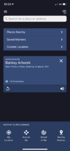 screenshot of the Soundscape home screen with a beacon set on the Banksy Artwork 1.8km away