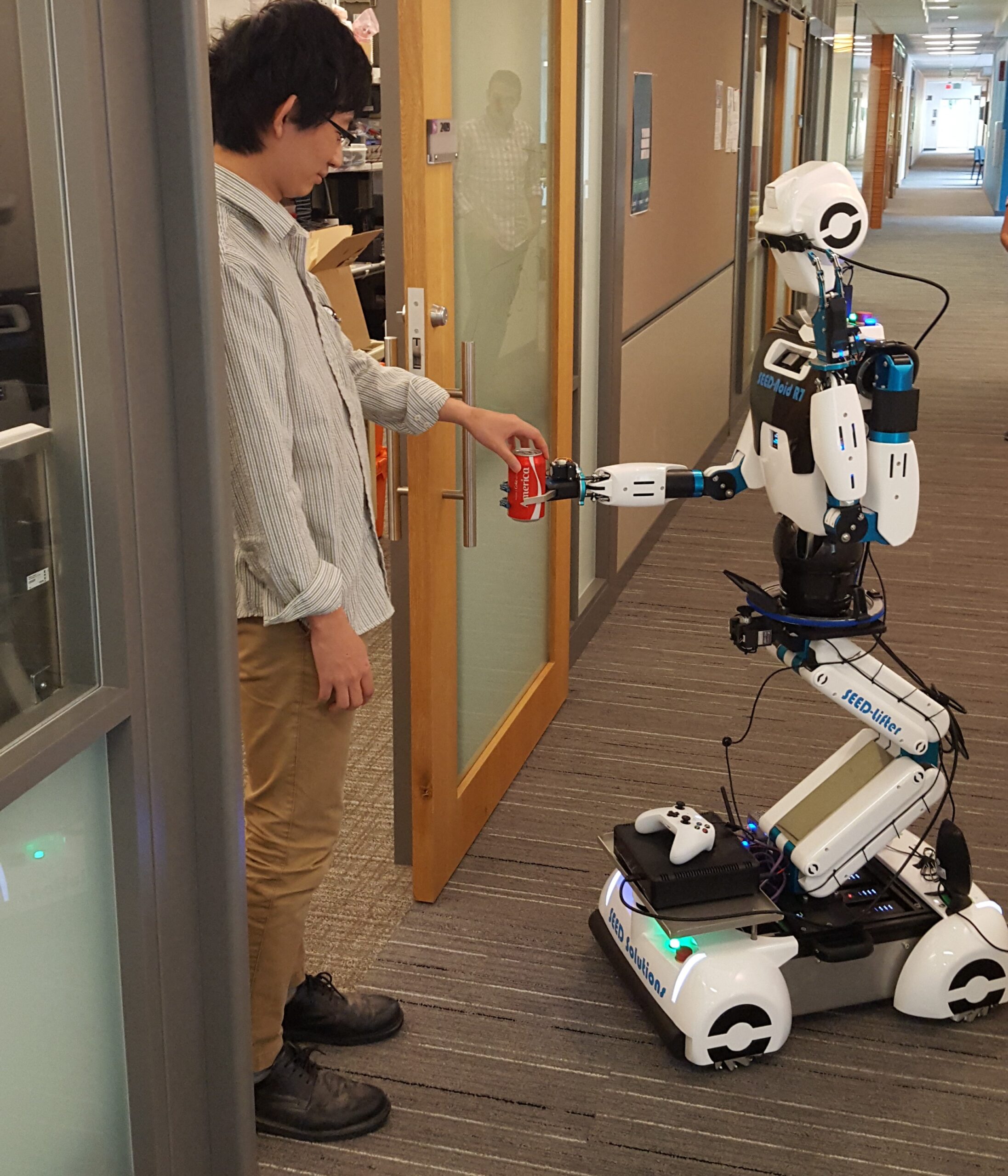 a person is interacting with a robot