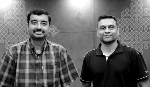 Black and white photo of Dr. Venkat Padmanabhan and Ajay Manchepalli