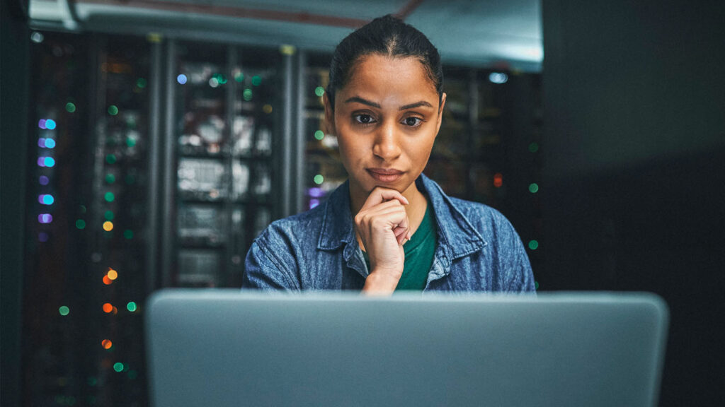 AI4Good - Expand Opportunity | woman looking at a computer screen