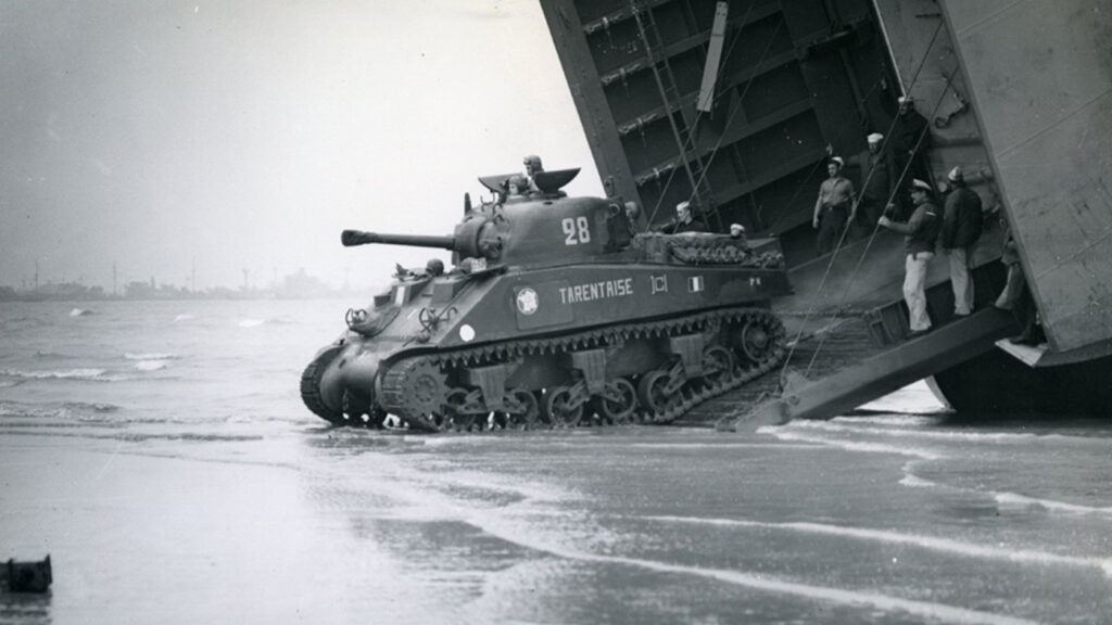 Tank being released onto Normandy beach