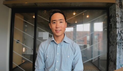 a man standing in front of a door