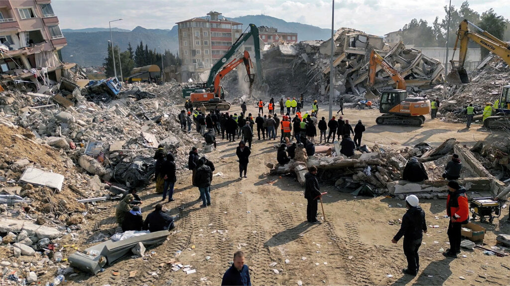 AI for Good - photo of people and heavy equipment cleaning up the aftermath of a major earthquake in Turkey
