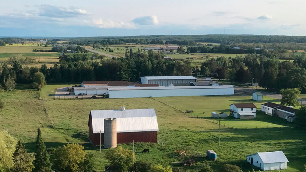 AI for Good - an expansive view of barns, a home, and other outbuildings on a rural farm