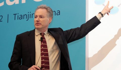 Eric Horvitz wearing a suit and tie