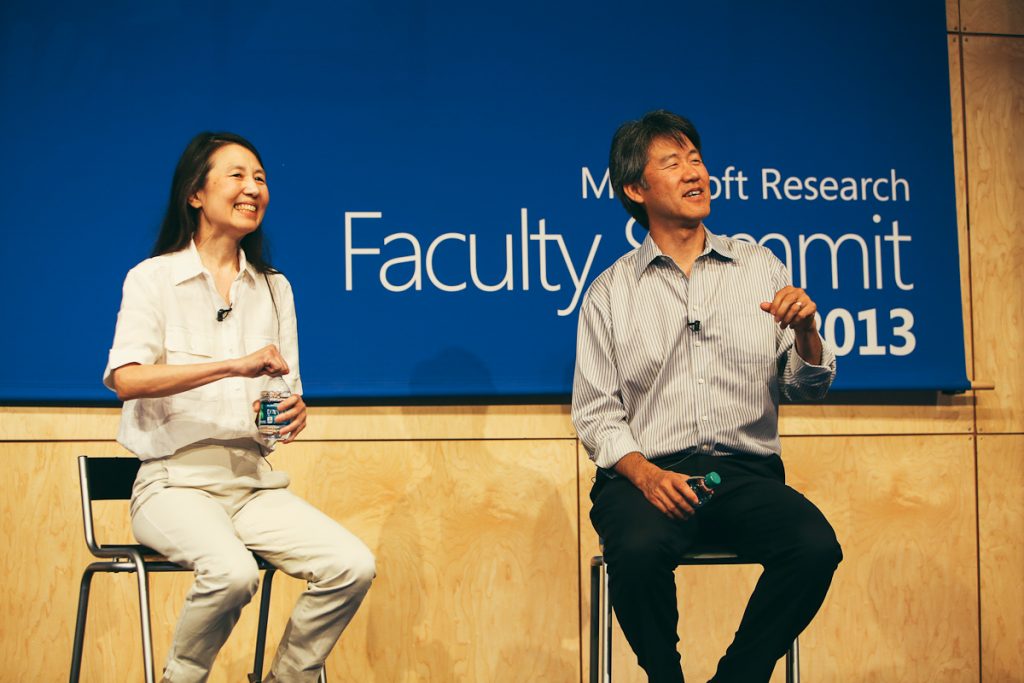 Keynote speakers Peter Lee, corporate vice president and head of Microsoft Research, and Jeannette Wing, Microsoft corporate vice president of Microsoft Research, speak about how basic research helps everyone on July 16 during the Microsoft Research Faculty Summit.
