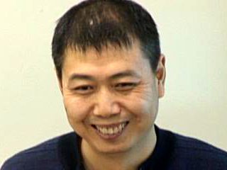 Wang Zhizhi smiling for the camera