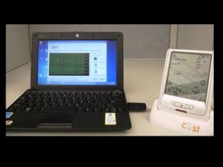 a laptop computer sitting on top of a table