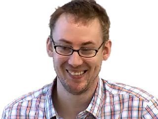 Joe Leonard wearing glasses and smiling at the camera