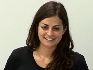 a woman smiling for the camera