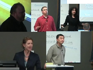 a group of people standing in front of a computer