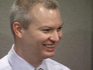 a man wearing a suit and tie