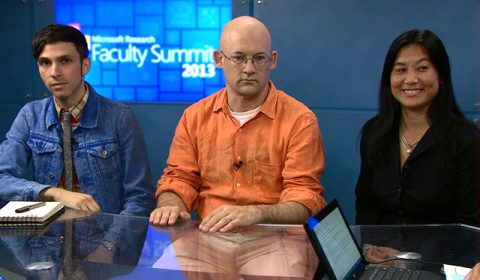 Clay Shirky, Lili Cheng sitting at a table using a laptop computer