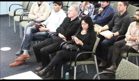 a group of people sitting in chairs