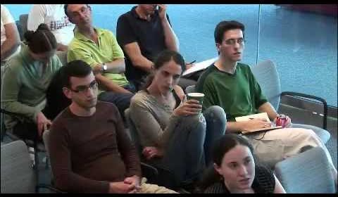 a group of people sitting in chairs