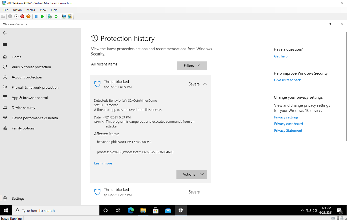 Screenshot of the Windows Security protection history screen showing that a coinminer threat was blocked by Intel TDT and Microsoft Defender.