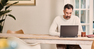 Image of a remote worker at his laptop.