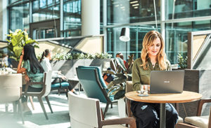 Image of a woman working at her office.